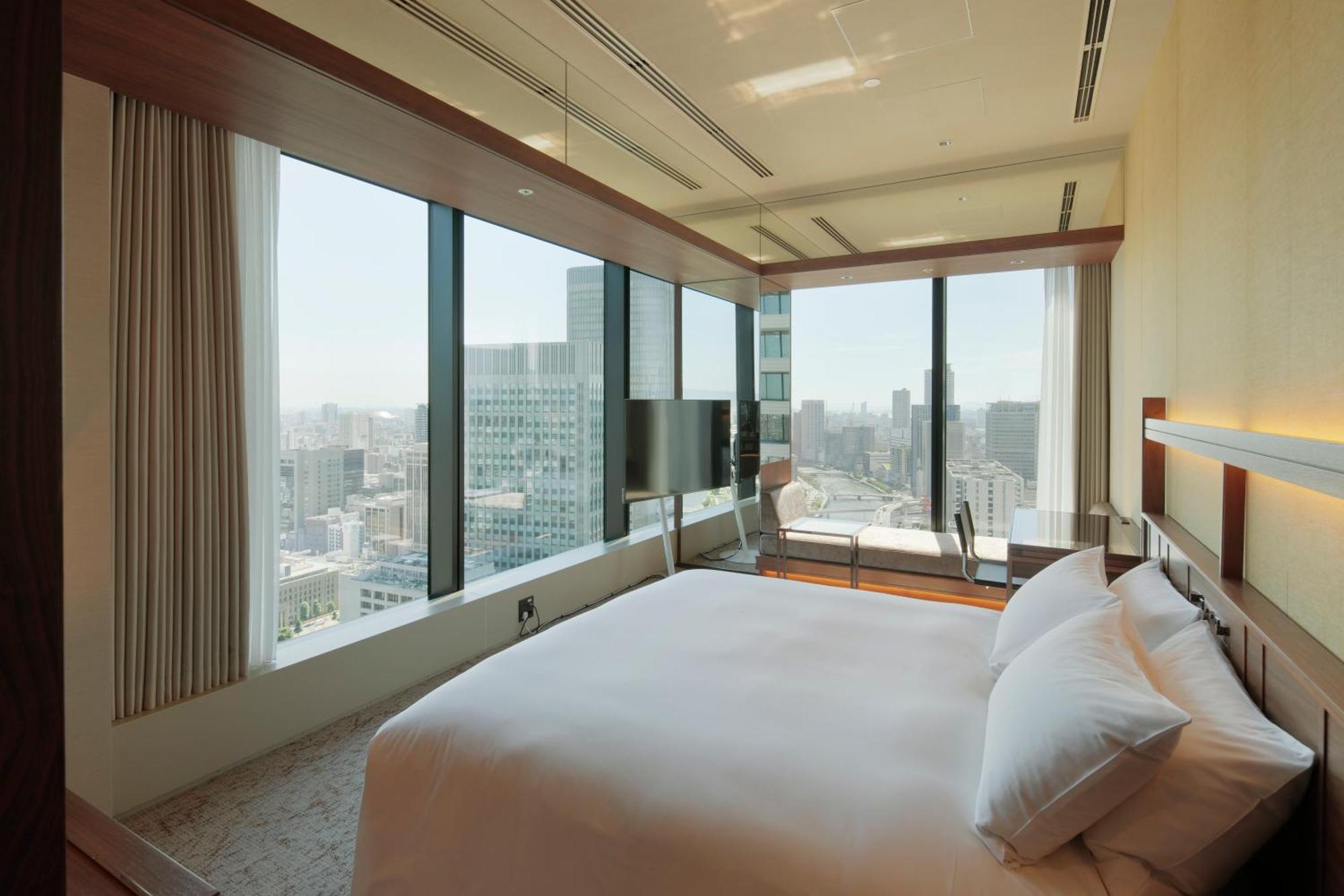 Candeo Hotels Osaka The Tower Εξωτερικό φωτογραφία A bedroom at the hotel